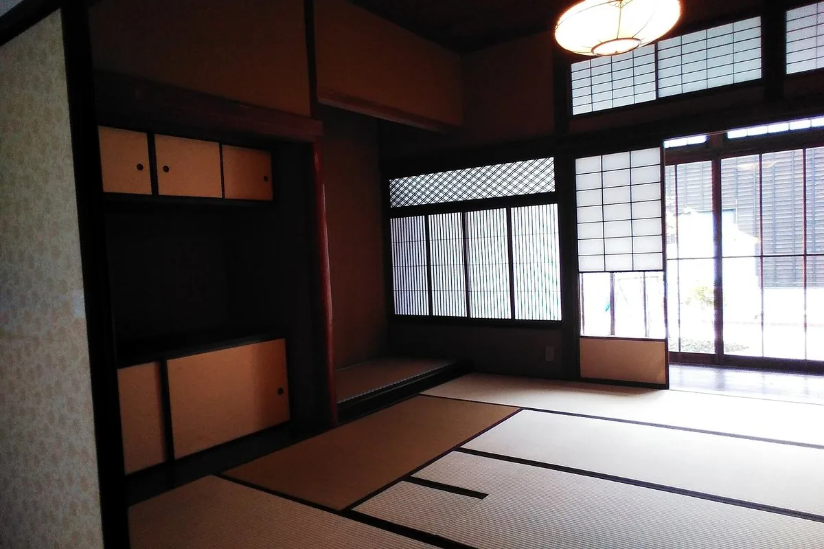 A tatami room with shoji screens filtering daylight